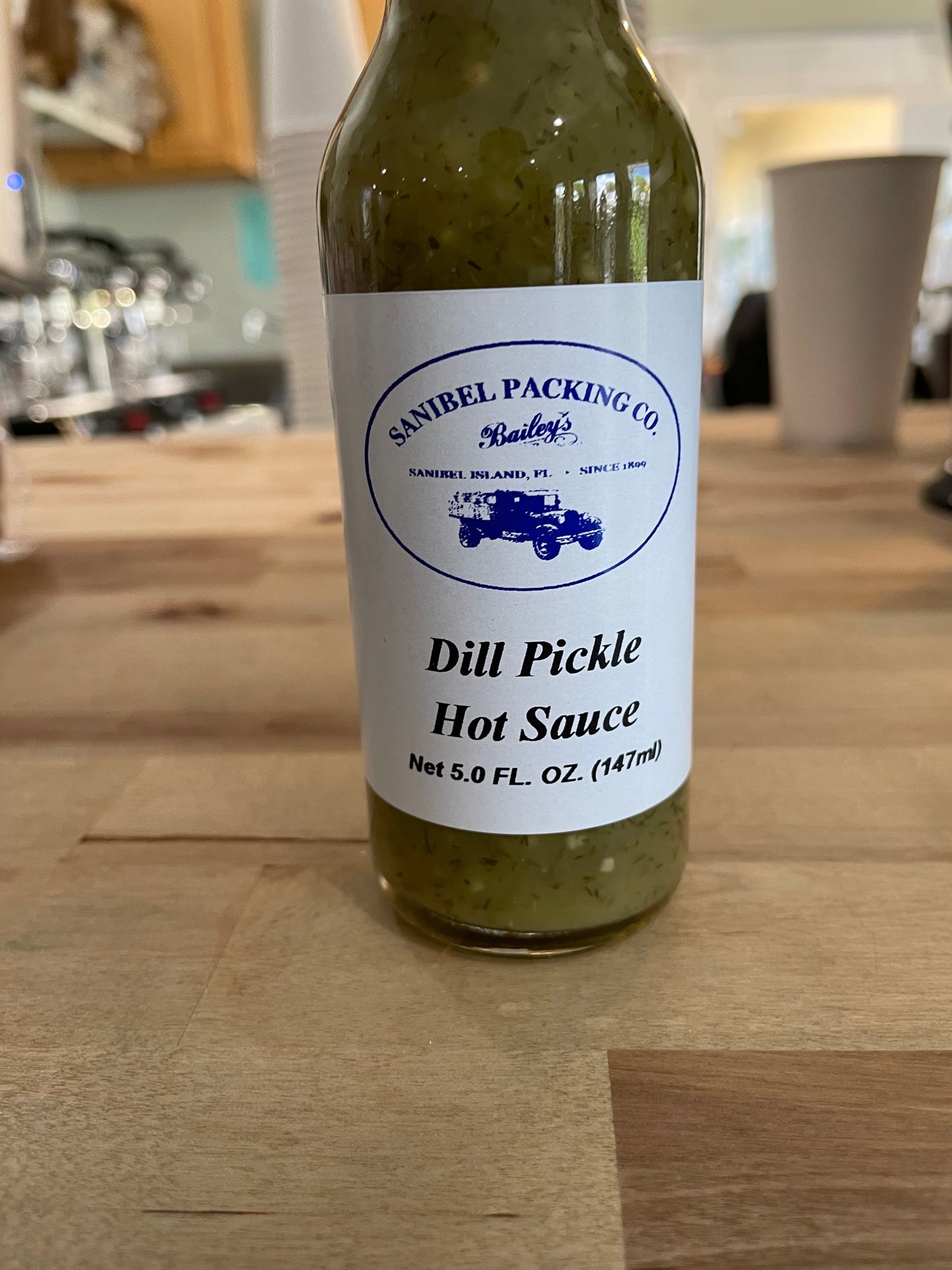 Dill Pickle Hot Sauce by Sanibel Packing Company